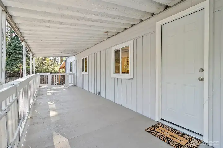 This giant covered porch welcomes you!