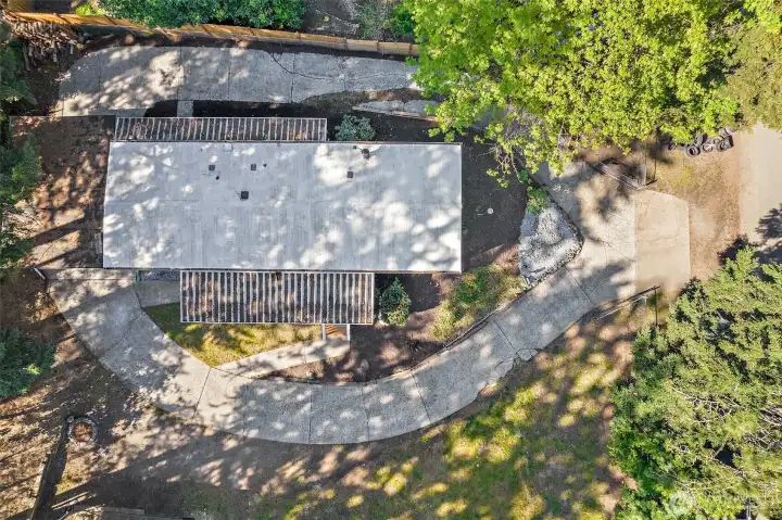 Overhead drone photo of house and property.