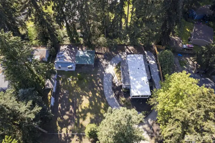 Drone photo.  Stick built home to the left is also for sale.  Multi family living option!