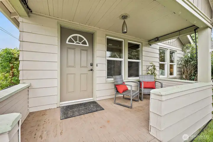 Welcoming covered front porch creates the perfect first impression with space to relax and enjoy the neighborhood charm.