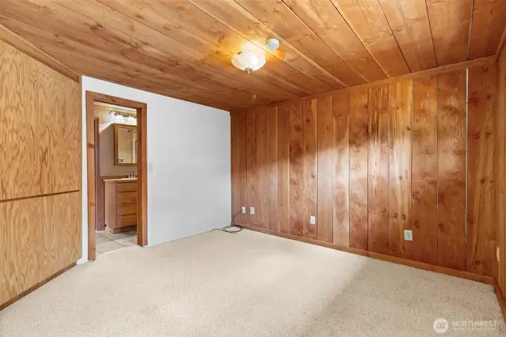 Primary Bedroom with custom corner closet Primary Bedroom with custom corner closet