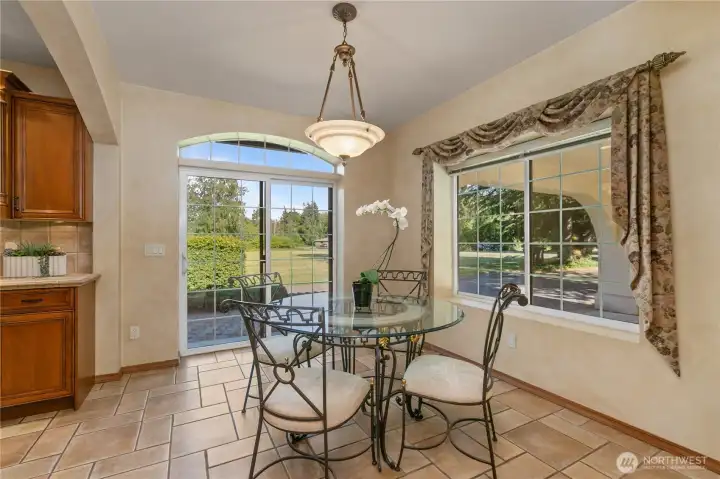 Bright breakfast nook with access to the outside.