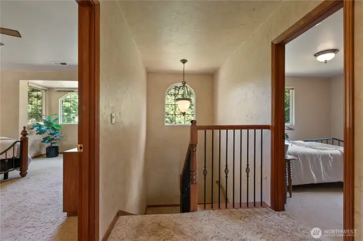 Head upstairs to the three bedrooms.