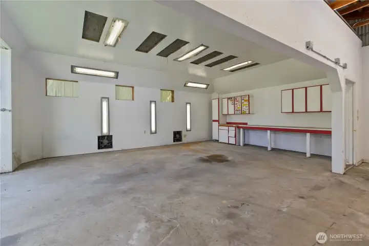 Outbuilding 1: Former car painting space with added lighting and ventilation.