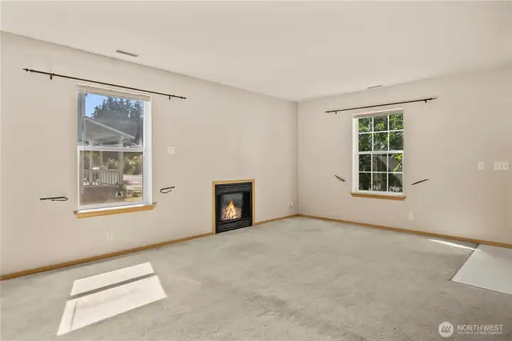 Closer view of the gas fireplace and living area.