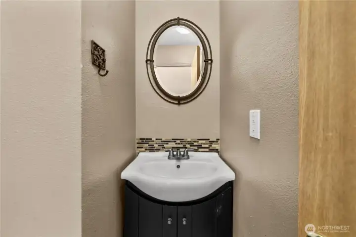 Half bath is conveniently located.