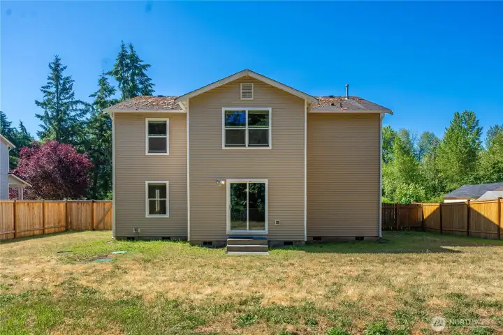 Back view of the home - vinyl siding offers easy maintenance.