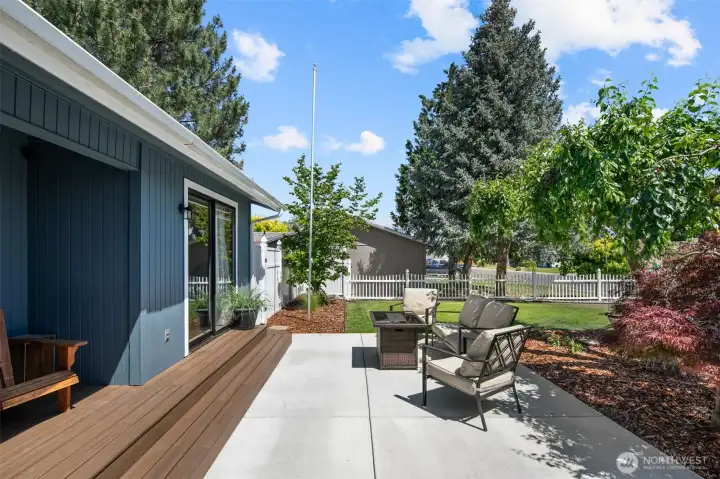 Quiet street allows for front patio relaxing, tree climbing & basketball playing.