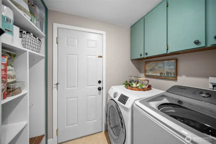 Laundry room, built-ins for storage & pantry.