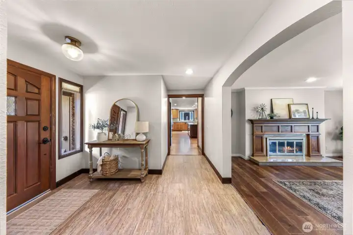 Another view of entryway into living room and kitchen.