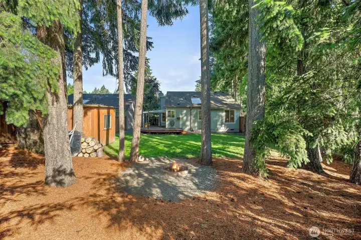 Outback features a Shed, firept, grassy area, deck & fully fenced!
