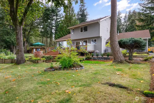 Backyard is beautifully landscaped