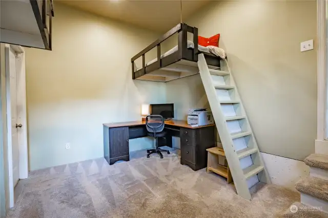 Bonus Room has two upper bunk beds and access to garage