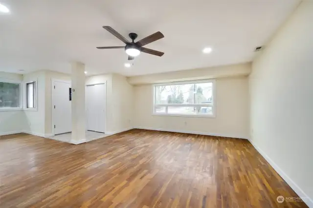 entrance. living room. ceiling fan. main level