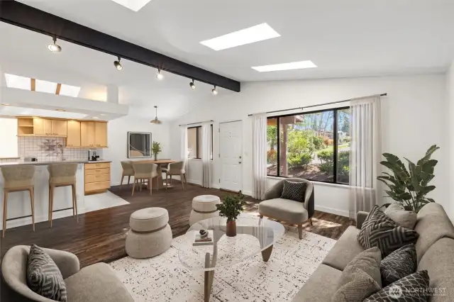 Main living room, dining and kitchen  virtually staged