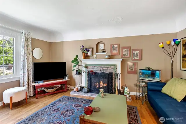 Oversized front window keeps this living space light and bright!