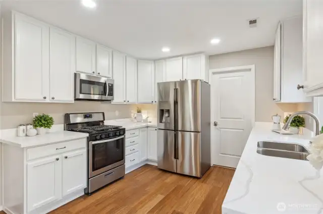 Updated quartz countertops & expansive pantry.