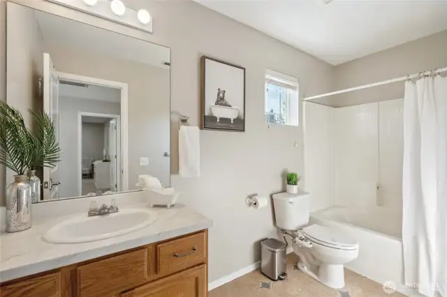 Remodeled full bath.