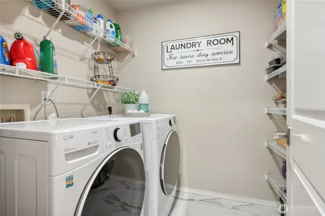 Modernized laundry area with new washer & dryer offer added convenience.