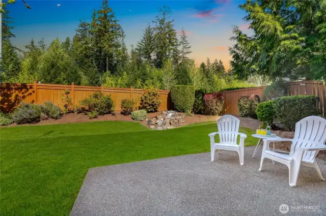 Private, serene backyard with lush landscaping, perfect for relaxing or entertaining.