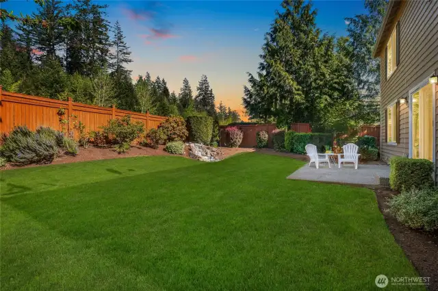 Soothing water feature and mature landscaping.