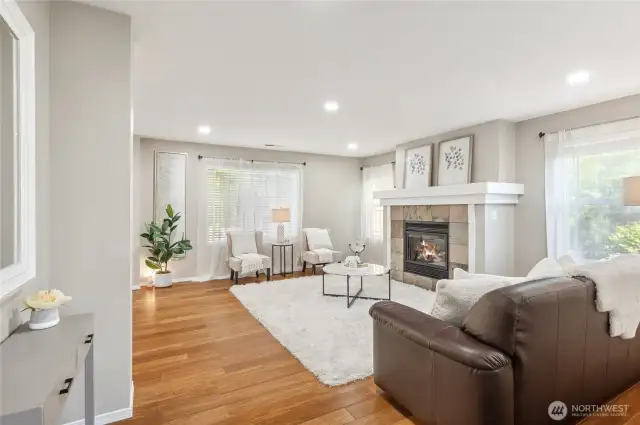 Engineered hardwood leading into family room.
