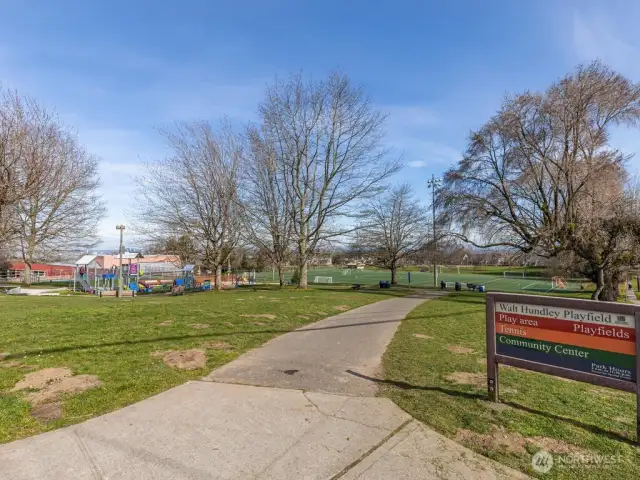 Nearby Walt Hundley Playfield has soccer, pickleball, tennis, playground, baseball field, and grass  with fabulous city and mountain views. Next to the park is High Point Community Center.