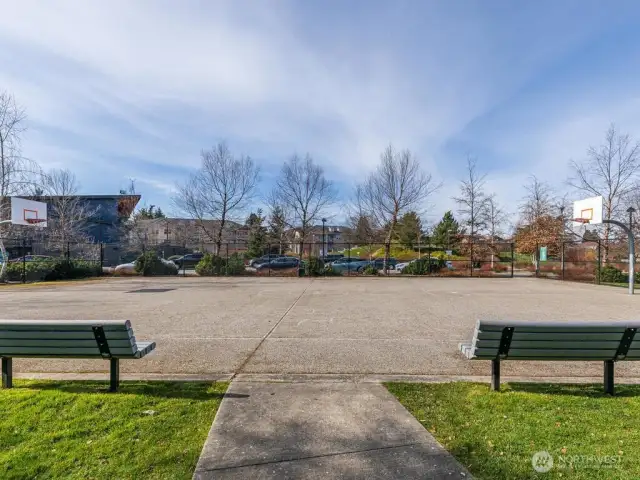 Basketball court and benches are also at High Point Commons Park adjacent to the Neighborhood House.