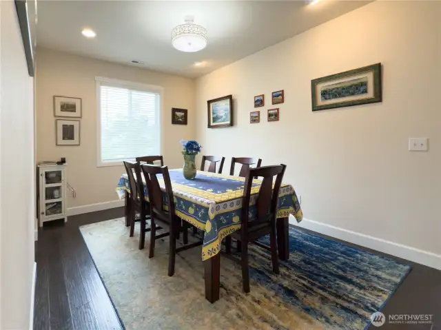 This room, currently used as a dining room, can easily be converted into a bedroom if needed.