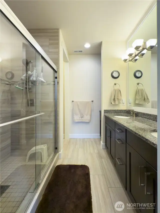 Upgraded tiled shower, floors, granite countered with double sinks in ensuite.