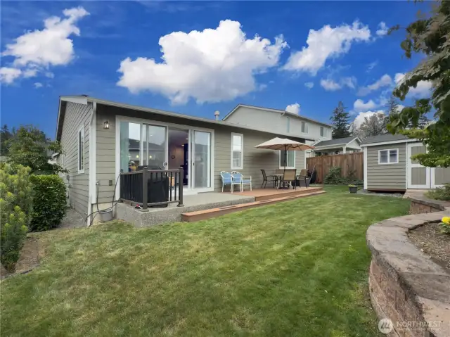 Rear patio and added composite deck allow private relaxation. The composite deck is a great space for relaxing or enjoying a barbeque with family and friends.