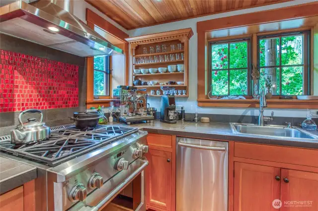 A GE Monogram range, purchased in 2024, adds a gourmet touch to the kitchen.