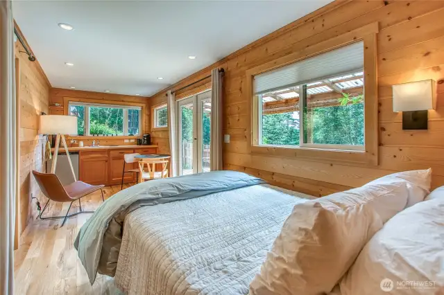 The studio interior is well appointed with tongue and groove paneling.