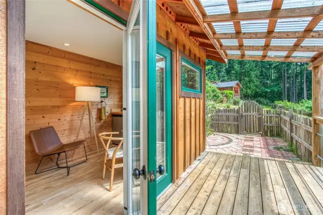 The large deck leads to a BBQ area for entertainment and relaxation.