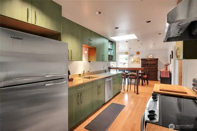 Stainless-steel KitchenAid refrigerator & dishwasher, & GE Profile range
