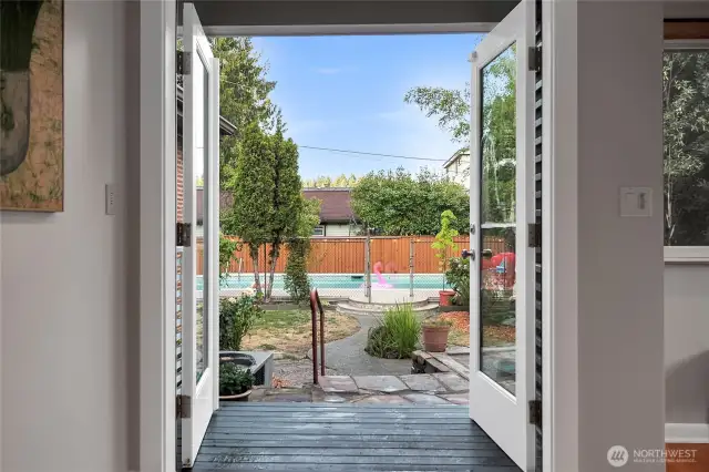 Open French doors for easy outdoor entertaining.
