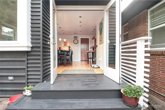Steps lead down to the patio.