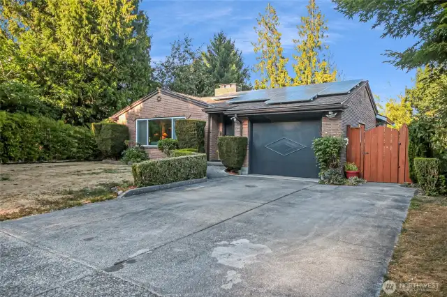 Attached garage + driveway parking