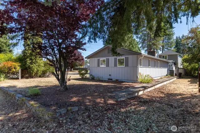 This is a large corner lot. Seen here to the right of the concrete sidewall is the second parcel. A perfect size for an RV or additional parking!