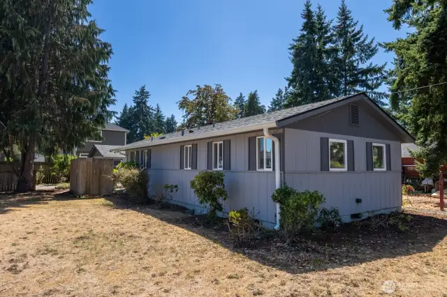 40 year roof and extra large 6-inch gutters and downspouts were installed just last year! Look at the cool shutters which are a nice feature.