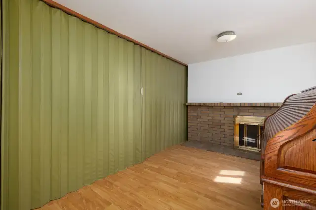 A view from the dining room area with the partition closed. The desk will be removed from the house!