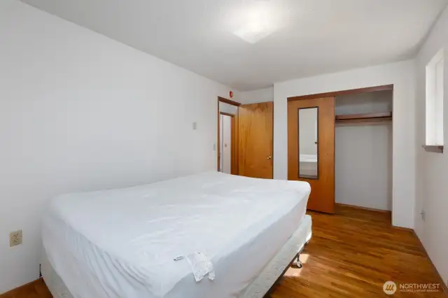 Another angle of the primary bedroom showing the closet.