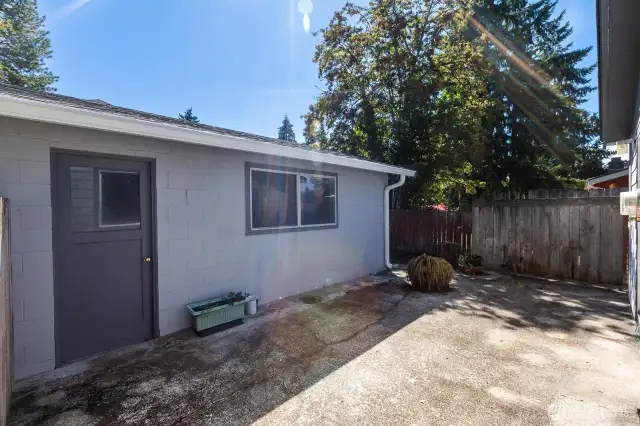 One car garage has separate entry, storage and has power.