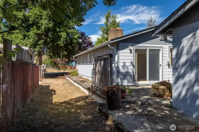 Here is the side yard showing the additional parcel & extra parking area.