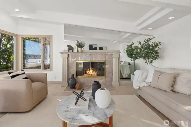 Classic design features a cozy fireplace, fresh paint, and new engineered hardwood floors - where tranquility meets refined comfort.