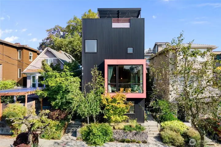 Welcome to Big Mouth House, lovingly named for it's large pink front window.