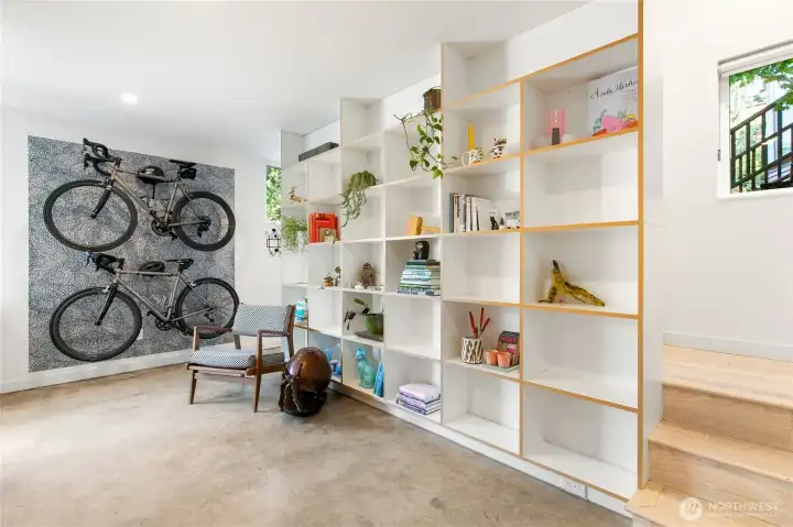 Built in bike storage and a two story built in book shelf are just a couple of the details you'll love about this home.