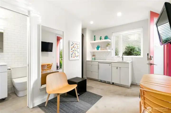 A built in ADU with separate entrance on the first level provides an opportunity for rental/Airbnb income, generational living, or a private retreat for guests.