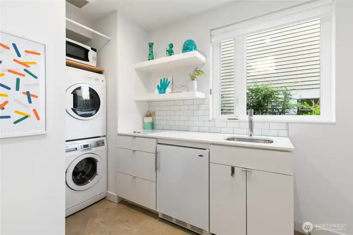 The ADU is equipped with its own washer/dryer and kitchenette.
