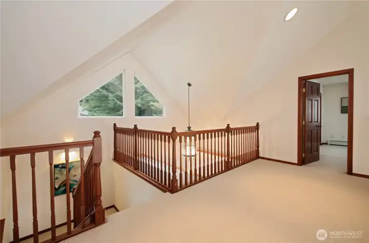 Upstairs Landing Connects Two Bedrooms and Full Bath
